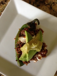 Stuffed pepper, with avocado and green sauce